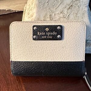 3 1/2” x 5” zip around Kate Spade billfold.